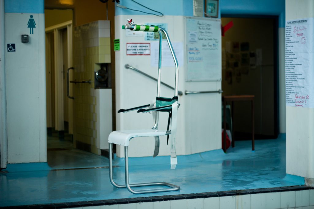 Image of the accessibility chair used to lift and lower people into the pool