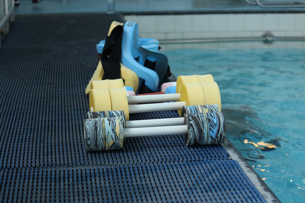 Image of aqua jogging equipment on the pool side